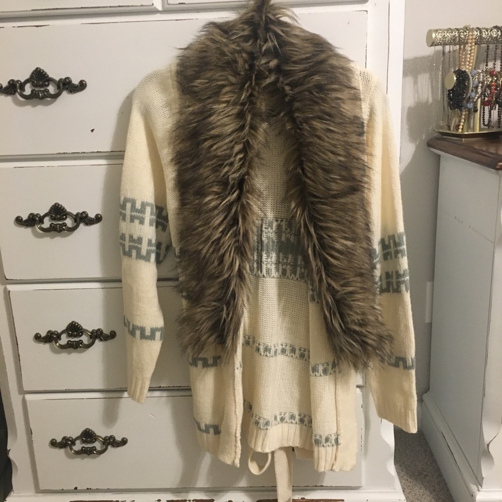 Cream sweater with fur trim